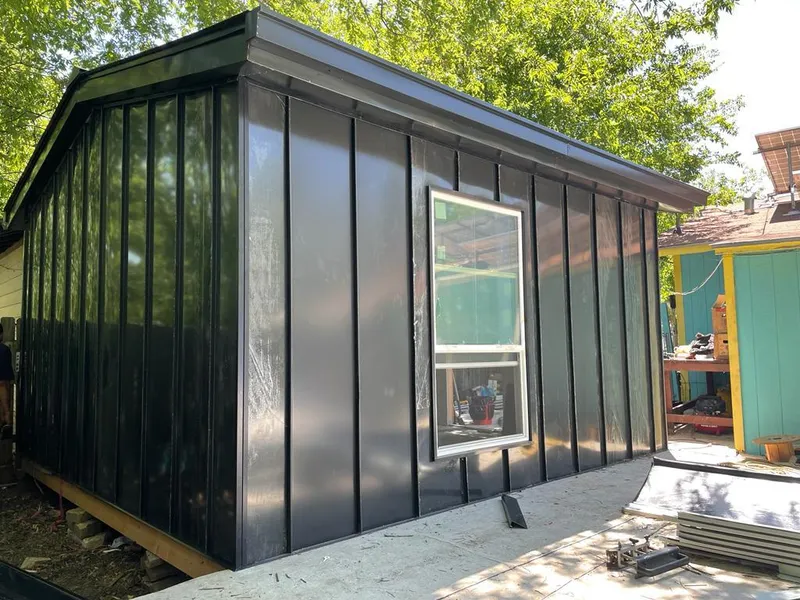 Black standing seam metal wall panels for Metal Roof Installation in Keene