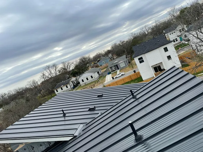 Standing seam metal roof panels with vents for Skylight Repair in Keene
